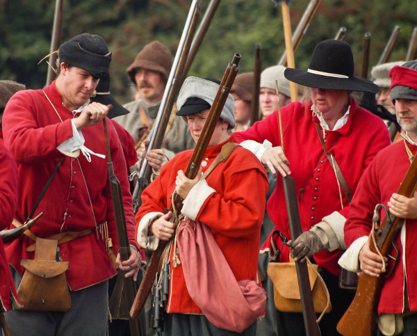 Musketeers of the Sealed Knot reload during their re-enactment of the siege of Basing House