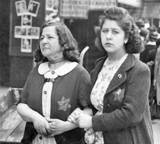 Two Jewish women in Paris wearing yellow stars