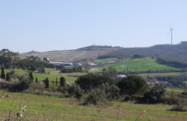 The hills in the distance are part of the natural defences  © Tom Williams