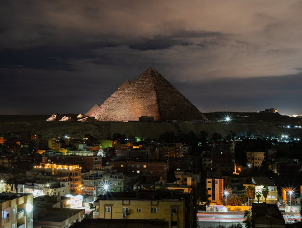 Giza City and Pyramids at Night
