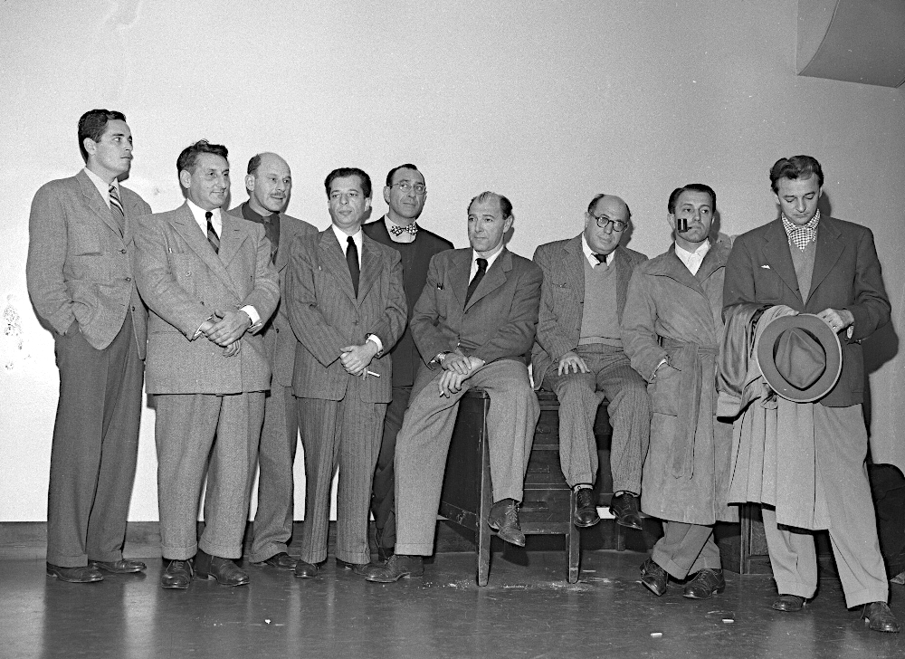 Nine of the 'Hollywood Ten' give themselves up